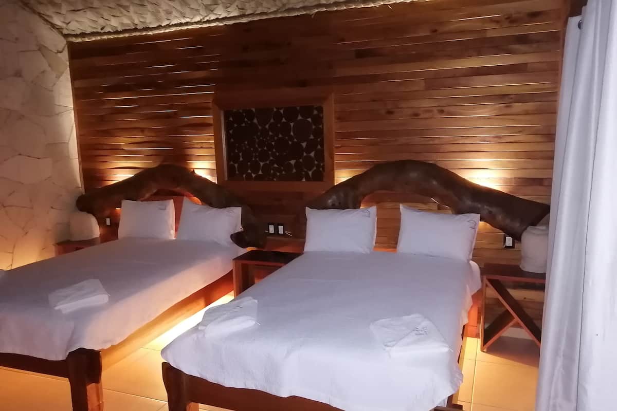 Exclusief huisje | Donzen dekbedden, Select Comfort-bedden, een kluis op de kamer