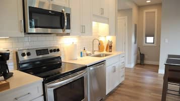 Microwave, coffee/tea maker, toaster, cookware/dishes/utensils