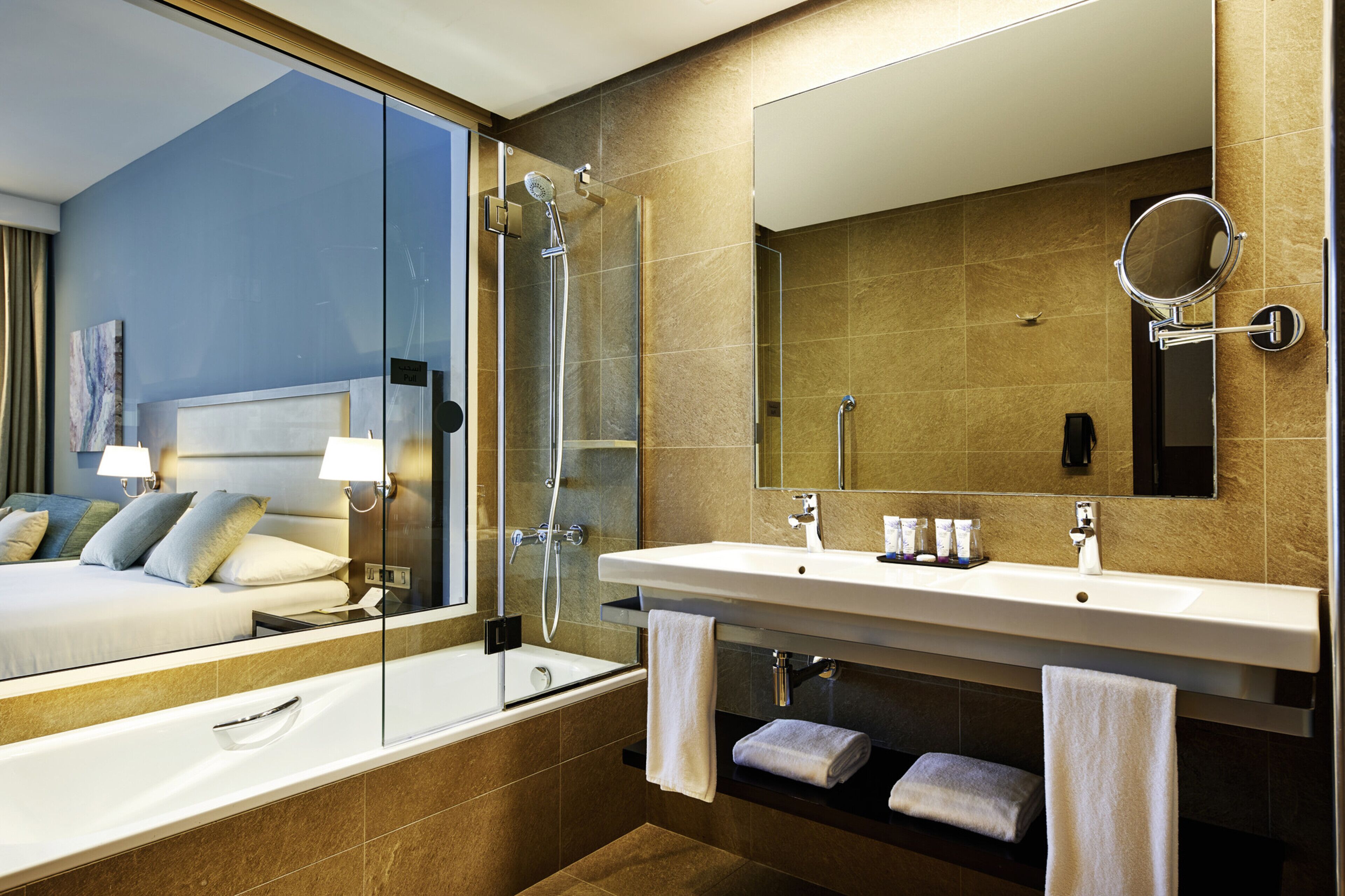 shower, eco-friendly toiletries, hair dryer, towels