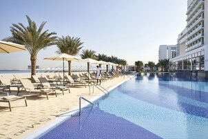 3 outdoor pools, pool umbrellas, pool loungers