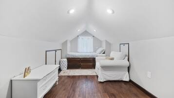 2 bedrooms, memory foam beds, iron/ironing board, travel crib