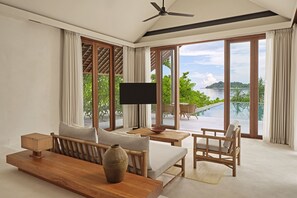 Villa, 1 Bedroom, Ocean View, Beachfront | Living room | 55-cm Smart TV with cable channels, TV, iPod dock