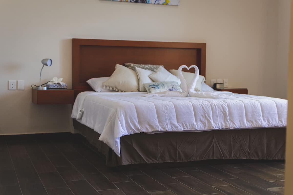 Suite Studio Deluxe | Coffres-forts dans les chambres, rideaux occultants