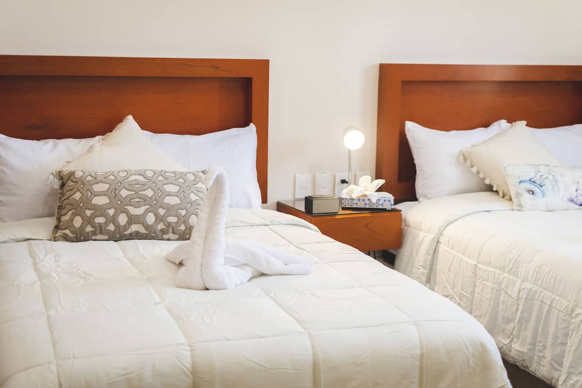 Chambre Double Deluxe | Coffres-forts dans les chambres, rideaux occultants