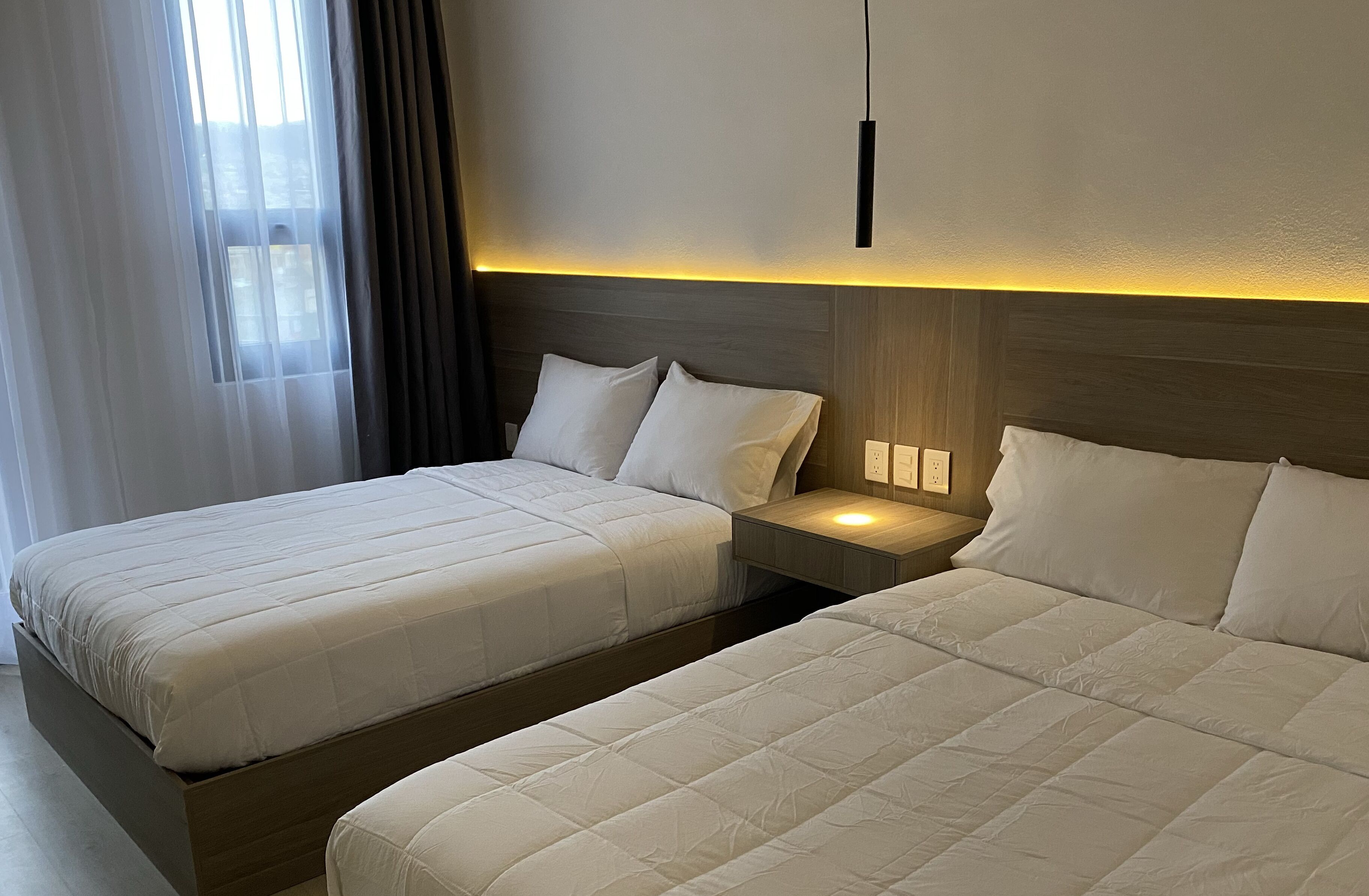 comfort quadruple room | down duvets, pillow-top beds, individually decorated