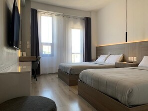 Comfort Quadruple Room | Down duvets, pillow-top beds, individually decorated