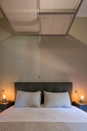 1 bedroom, desk, iron/ironing board, travel crib