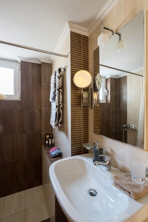 Hair dryer, towels, soap, shampoo