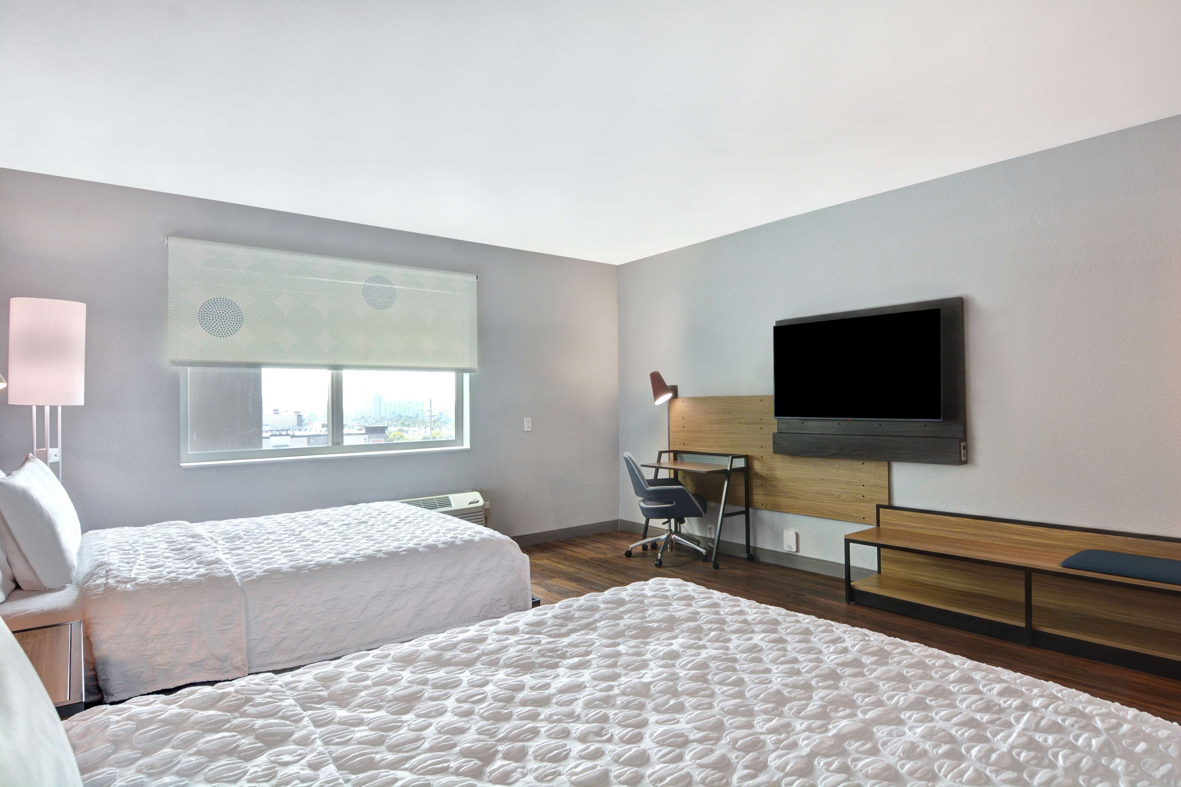 desk, blackout curtains, iron/ironing board, free cots/infant beds