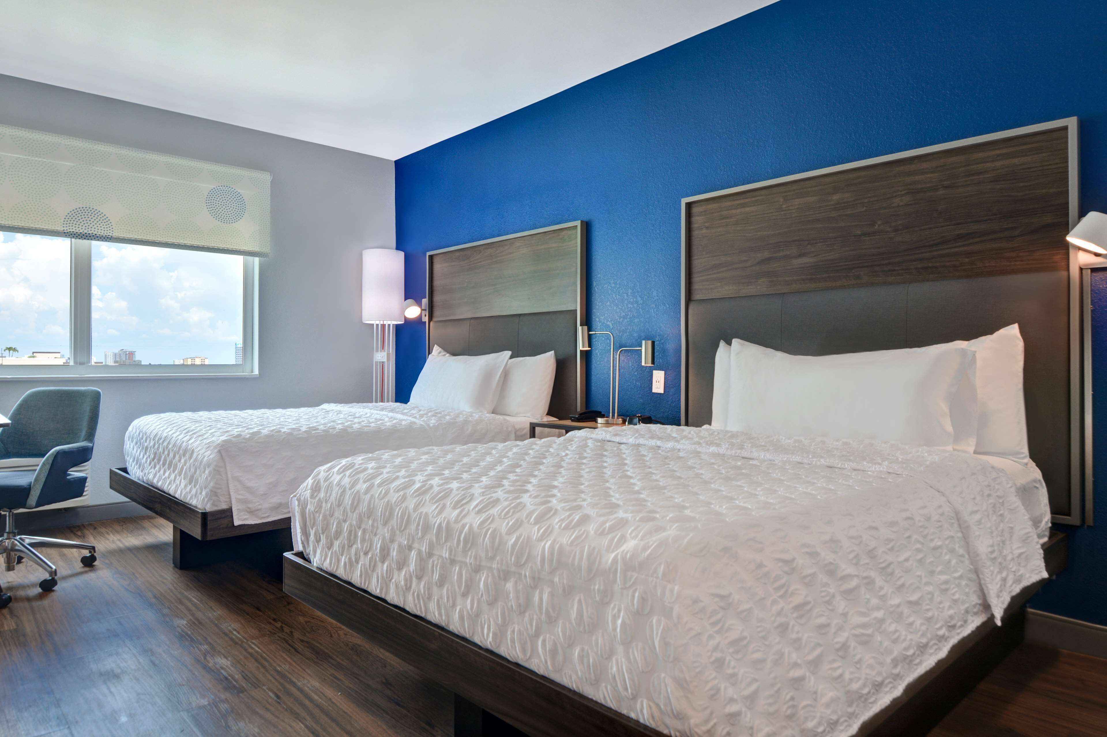 desk, blackout curtains, iron/ironing board, free cots/infant beds