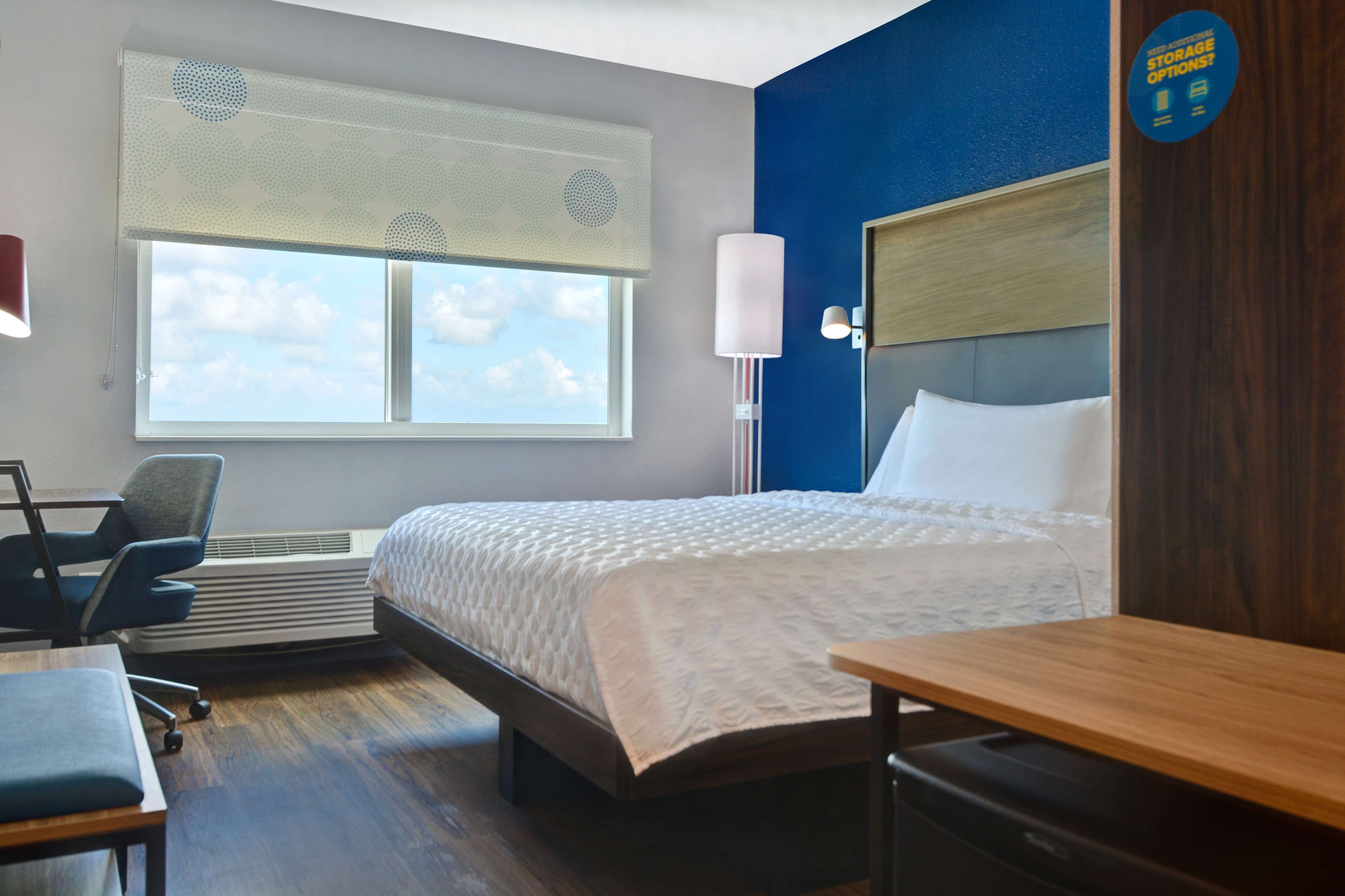 desk, blackout curtains, iron/ironing board, free cots/infant beds