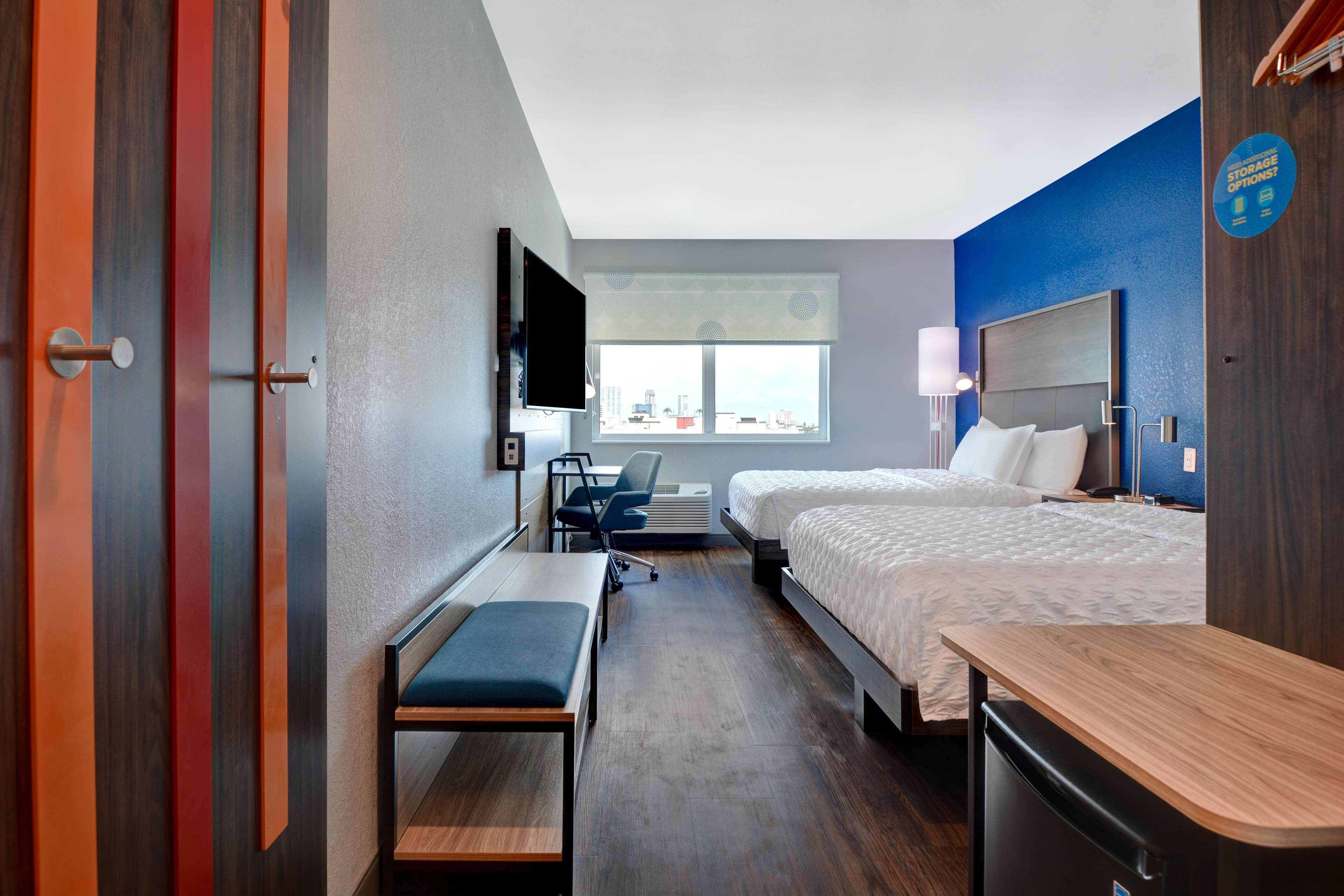 desk, blackout curtains, iron/ironing board, free cots/infant beds