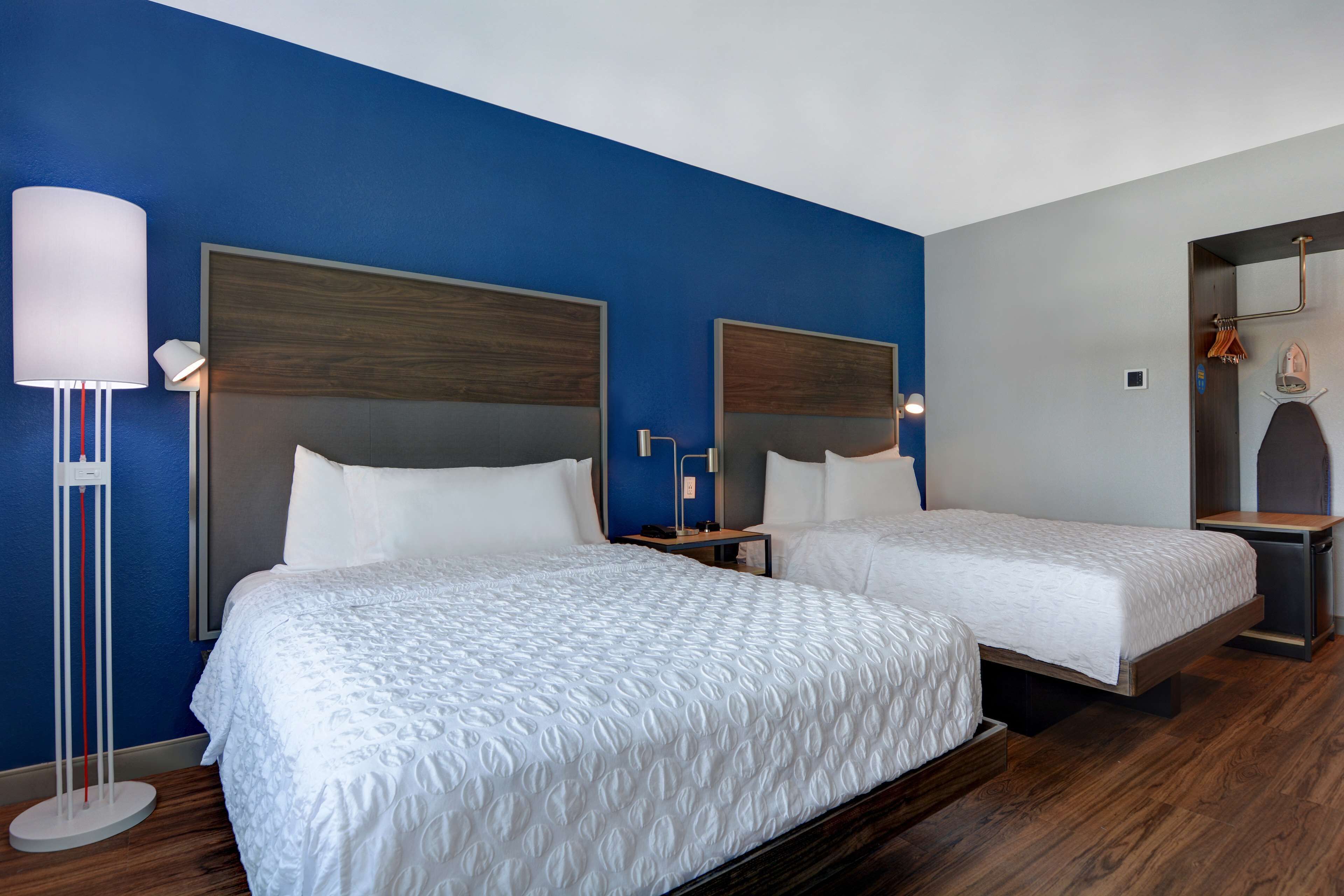 desk, blackout curtains, iron/ironing board, free cots/infant beds