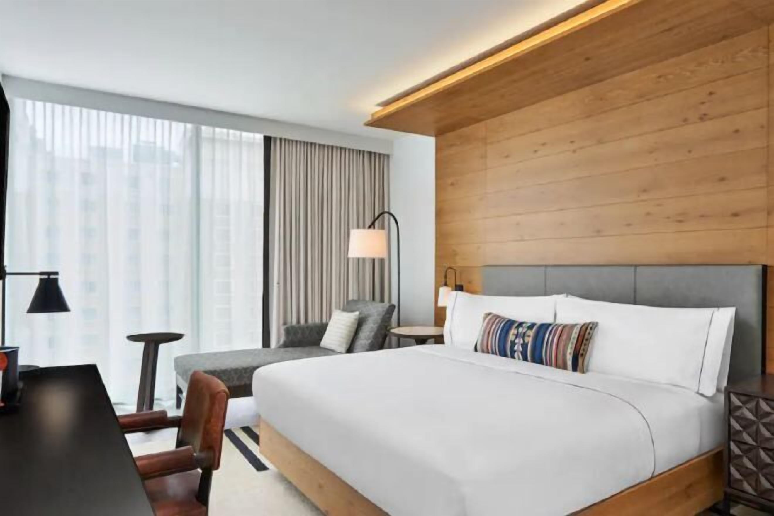 Premium bedding, down comforters, pillowtop beds, in-room safe