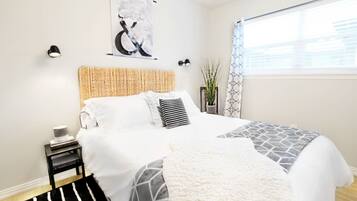 1 bedroom, desk, iron/ironing board, travel crib