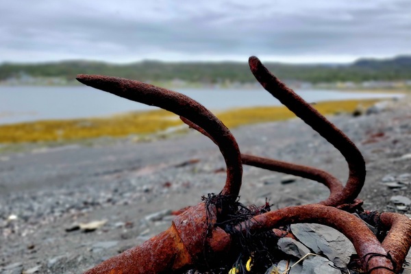 Anchors at Uncle John's Channel on the beach by The Blackfin