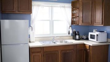 Fridge, microwave, coffee/tea maker, toaster