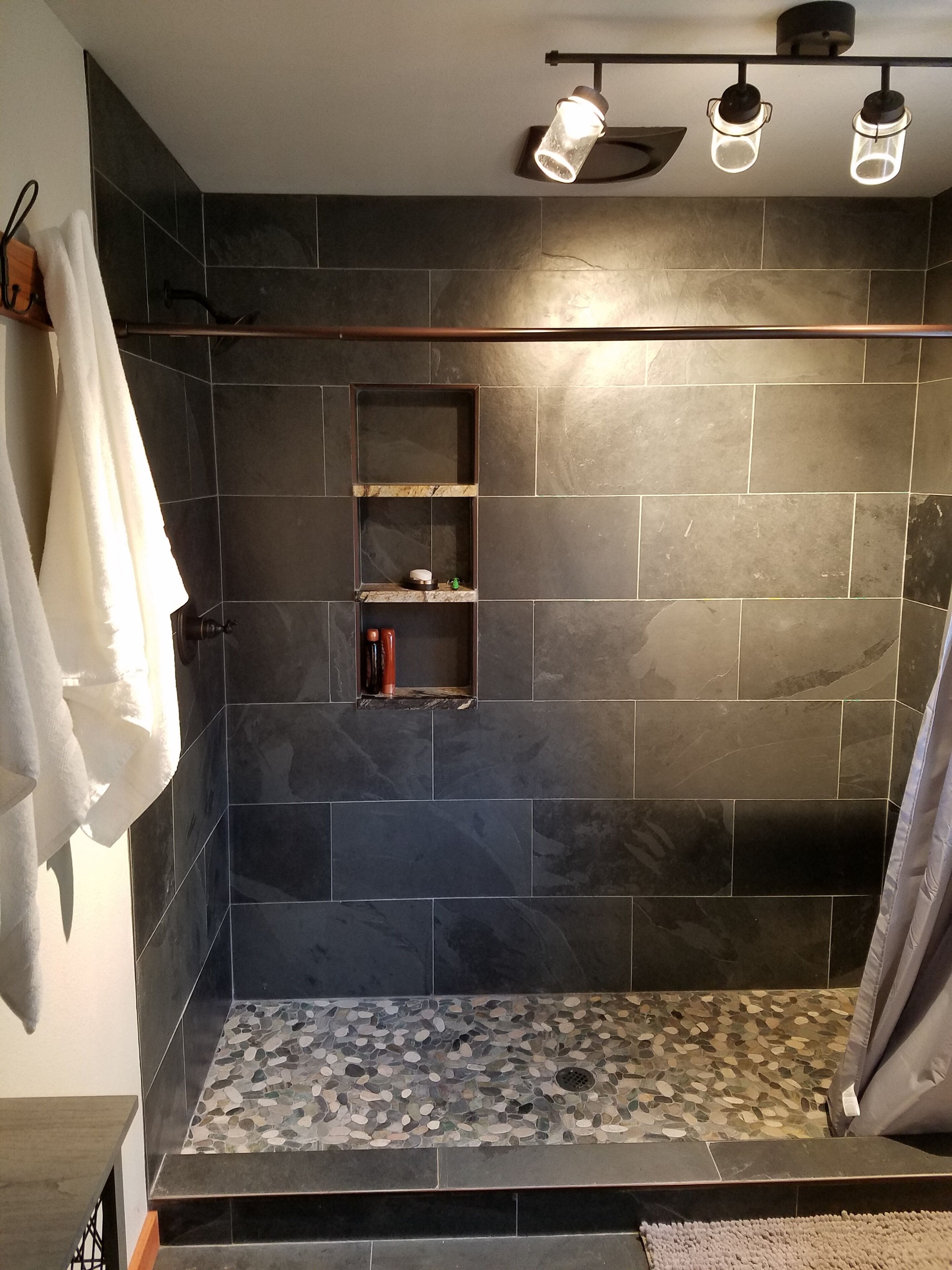 Combined shower/tub, hair dryer, towels, soap