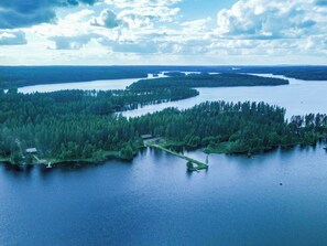 A lakeside property with a dock, surrounded by dense forest and multiple islands. - Suvituuli by Interhome (Pertunmaa)