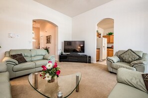 Villa (Highlands Reserve Golf Course 4 Bedro) | Living room | Flat-screen TV, table football