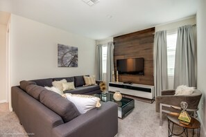 Villa (Solara Resort 9 Bedroom  6 Bathroom R) | Living room | Flat-screen TV - Solara Resort 9BD / 6BA Resort Villa 9043srl (Kissimmee)