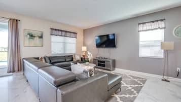 Villa | Living room | Flat-screen TV, fireplace