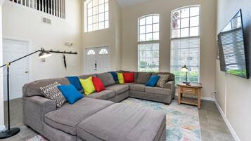 Villa (Luxury 5 Bedroom 4 Bath Villa With B) | Living room | Flat-screen TV, foosball