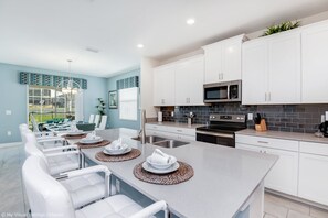 Villa (1564FLANGE) | Private kitchen | Dining tables - Flange Drive Champions Gate 1564 (Davenport)