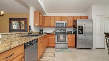 Villa (234GLEN Fantastically decorated 4 bed) | Private kitchen | Fridge, microwave, dishwasher, cookware/dishes/utensils