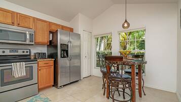 Villa (234GLEN Fantastically decorated 4 bed) | Private kitchen | Fridge, microwave, dishwasher, cookware/dishes/utensils