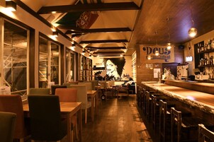 Lunch, dinner served; local and international cuisine, beach views 