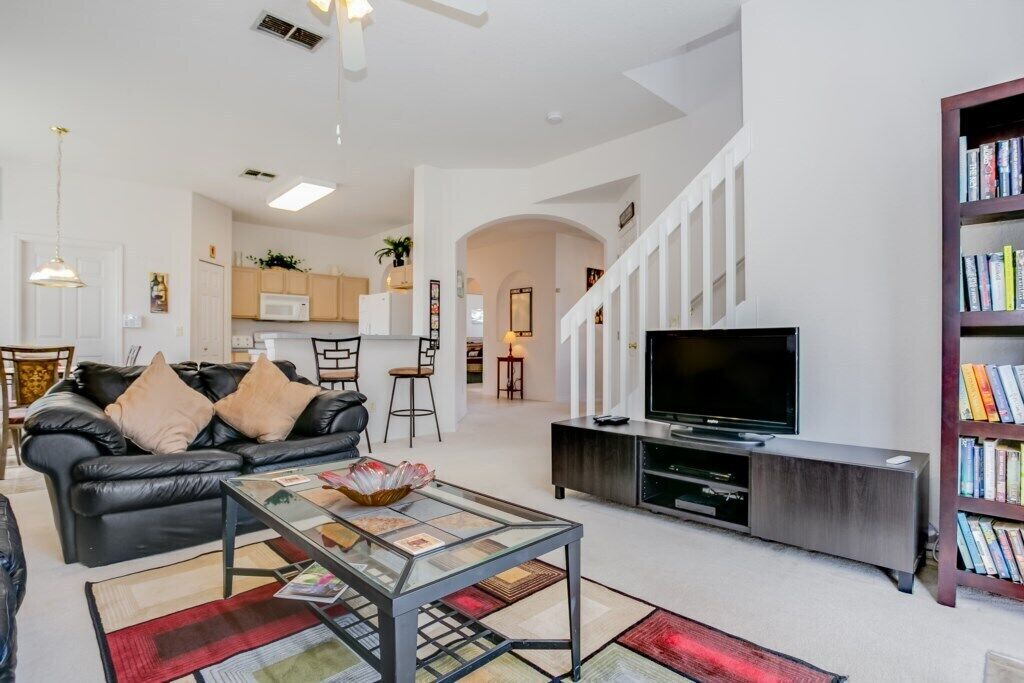 Villa | Living room | Flat-screen TV, fireplace, table football