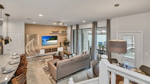 Apartment (2413DUBAI) | Living room | Flat-screen TV - dubai Villa Windsor At Westside  2 (Kissimmee)