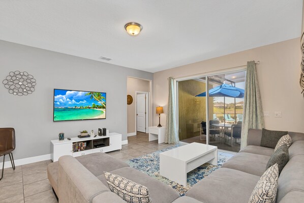 Villa (5132OA 5 bed with games room and spa ) | Living room | Flat-screen TV