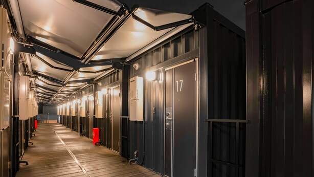 A corridor with multiple doors, each marked with a number, leading to individual rooms. - Hotel R9 The Yard Ashikagaekinishi (Ashikaga)