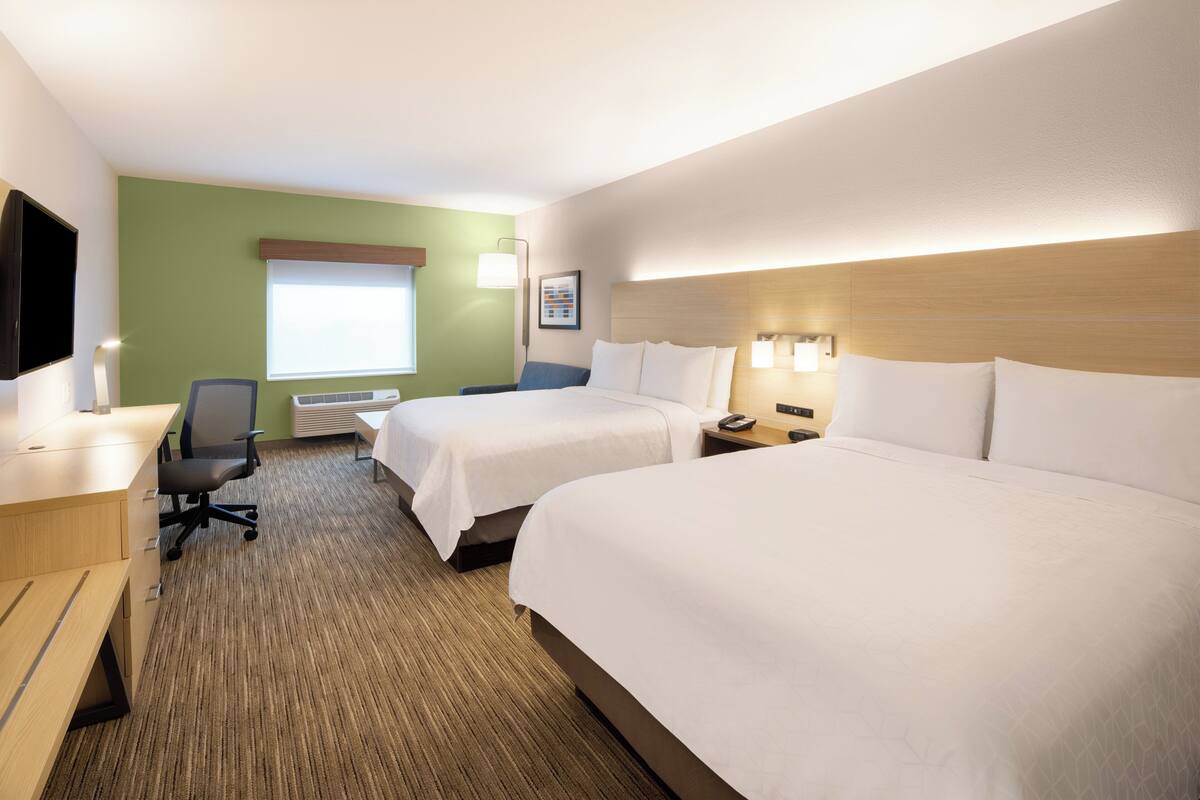 Hypo-allergenic bedding, pillow-top beds, in-room safe, desk