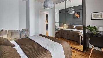 1 bedroom, desk, iron/ironing board, travel crib