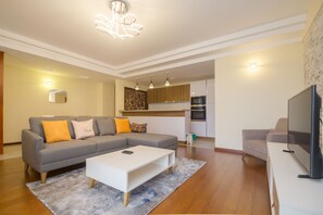 36-inch flat-screen TV with satellite channels, LED TV, pay movies - Kiluwa Apartments & Spa  by Dunhill Serviced Apartments (Nairobi)