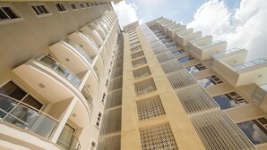 A high-rise building with multiple balconies and large windows. - Kiluwa Apartments & Spa  by Dunhill Serviced Apartments (Nairobi)