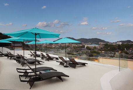 Seasonal outdoor pool, open 10:00 AM to 7:00 PM, cabanas (surcharge)