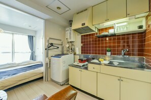 Apartment (502) | Private kitchen | Fridge, microwave, electric kettle, griddle - [502] Space Minami 4 jo 502 (Sapporo)
