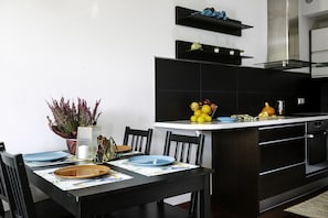 City Apartment | Private kitchen | Full-size fridge, microwave, stovetop, dishwasher