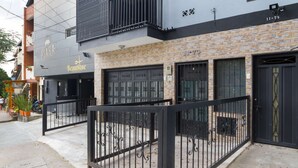 A modern building with a boutique hotel named 'PIARA' and 'Beautique'. - 3 Bedroom Balcony, 3 Hot Tubs, AC (Medellin)
