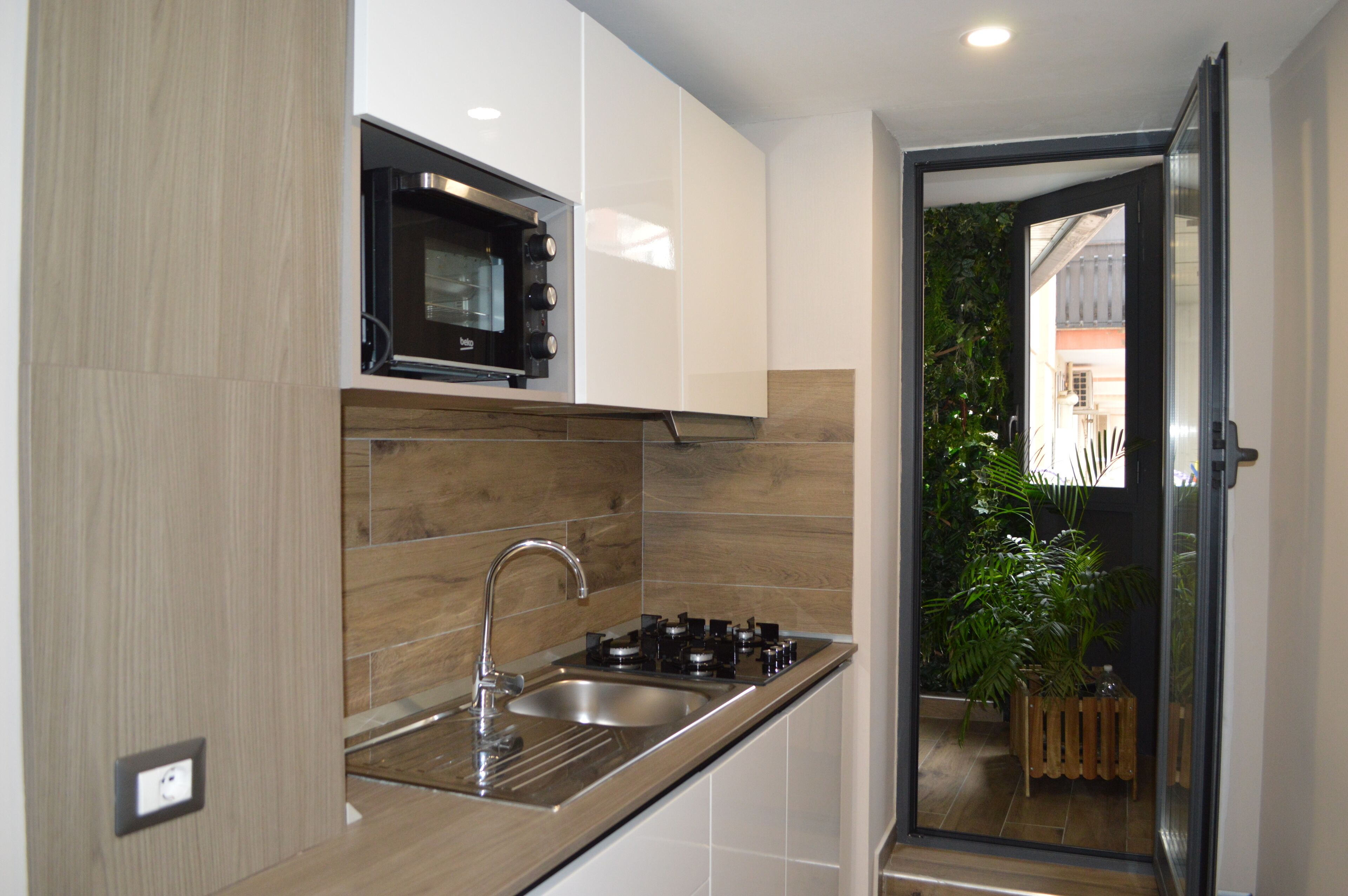 Classic Quadruple Room | Private kitchen | Mini-fridge, electric kettle