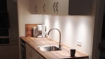 Triple Room (private kitchen - not in room) | Private kitchen | Mini-fridge, microwave, oven, stovetop