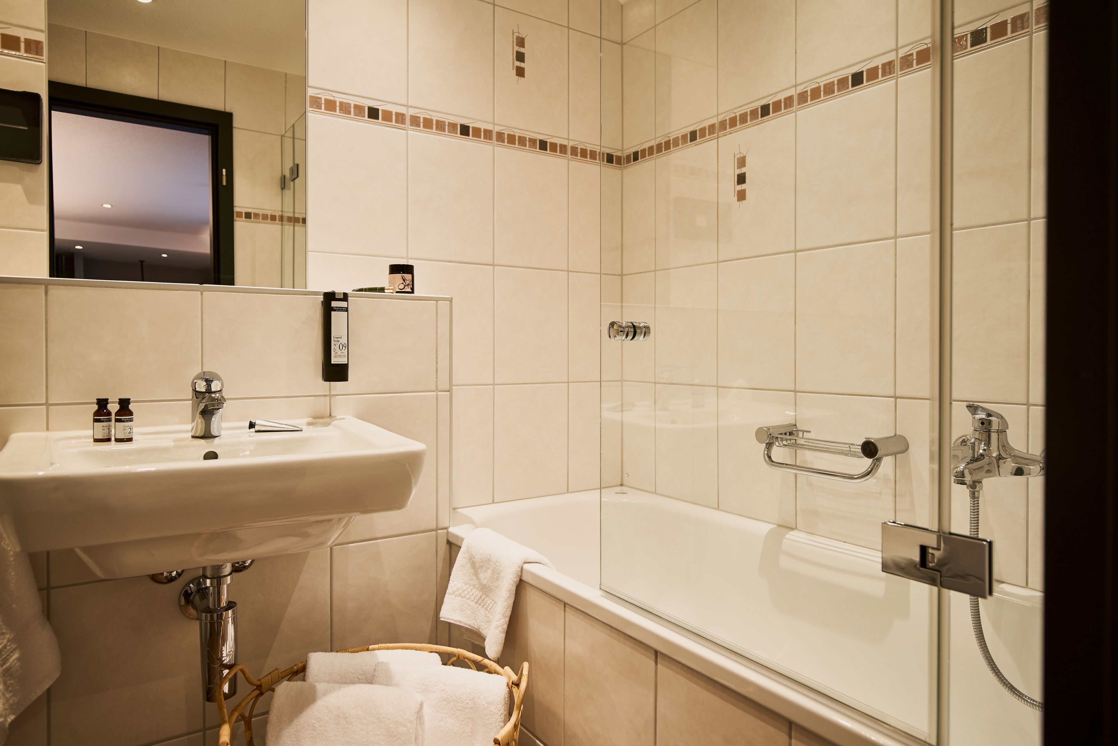 free toiletries, hair dryer, towels, toilet paper