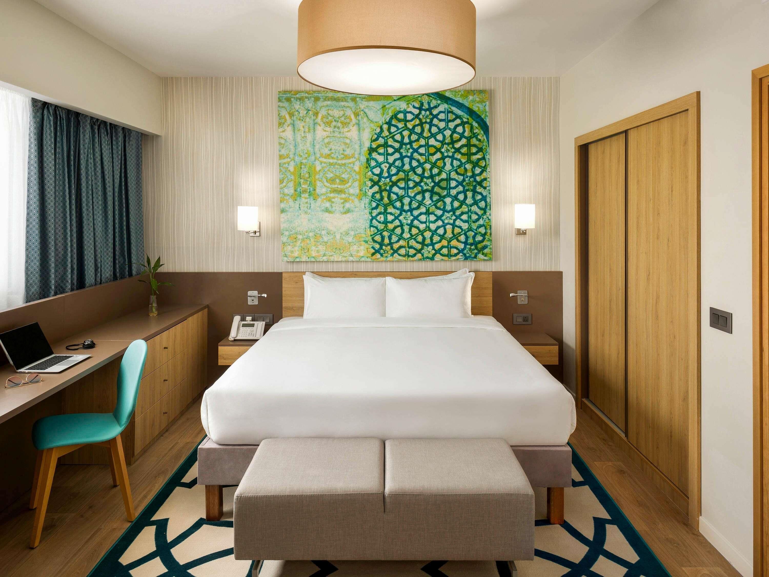 Standard Apartment, 1 Bedroom | Minibar, in-room safe, desk, laptop workspace