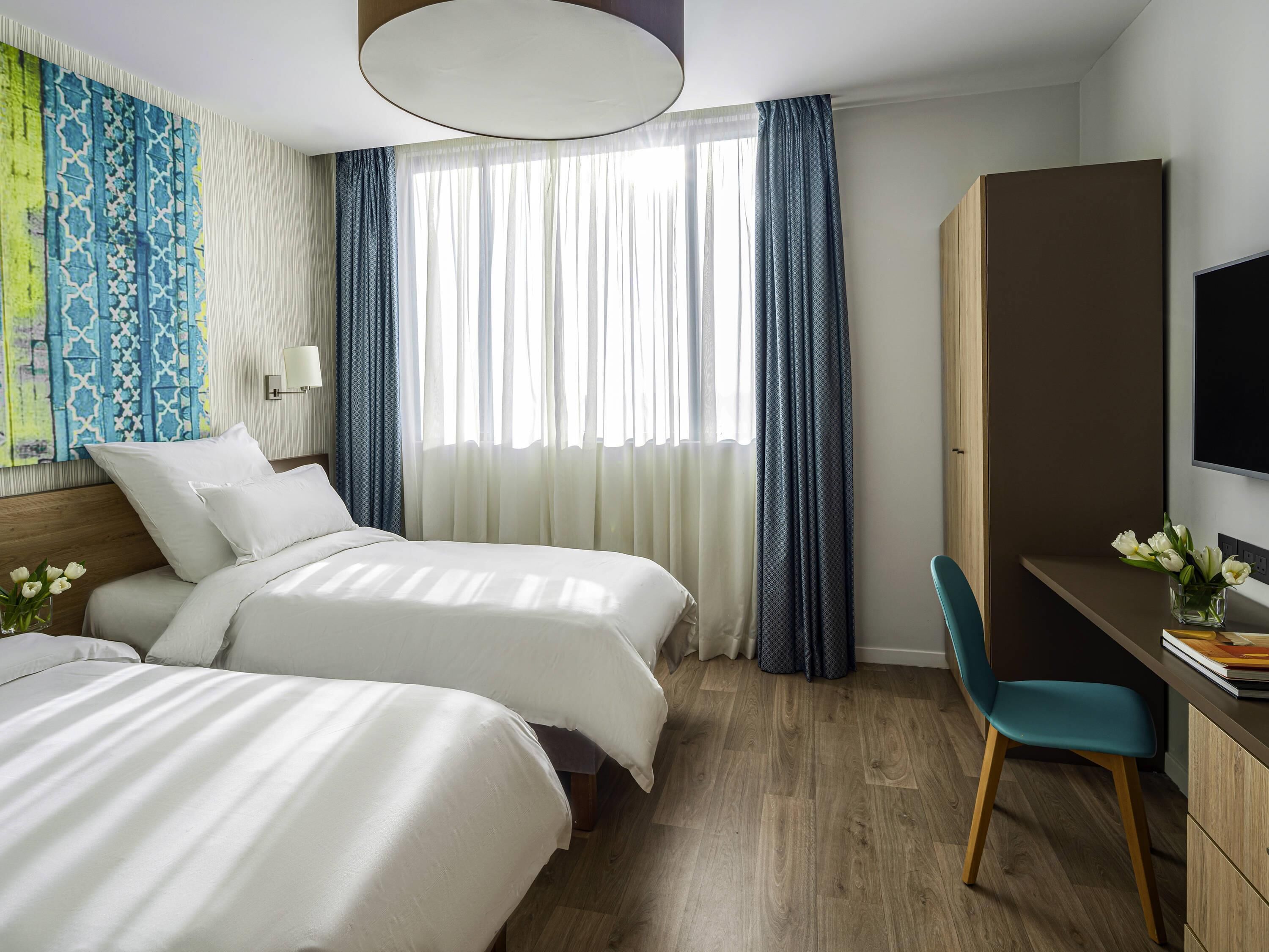 Standard Apartment, 2 Bedrooms | Minibar, in-room safe, desk, laptop workspace