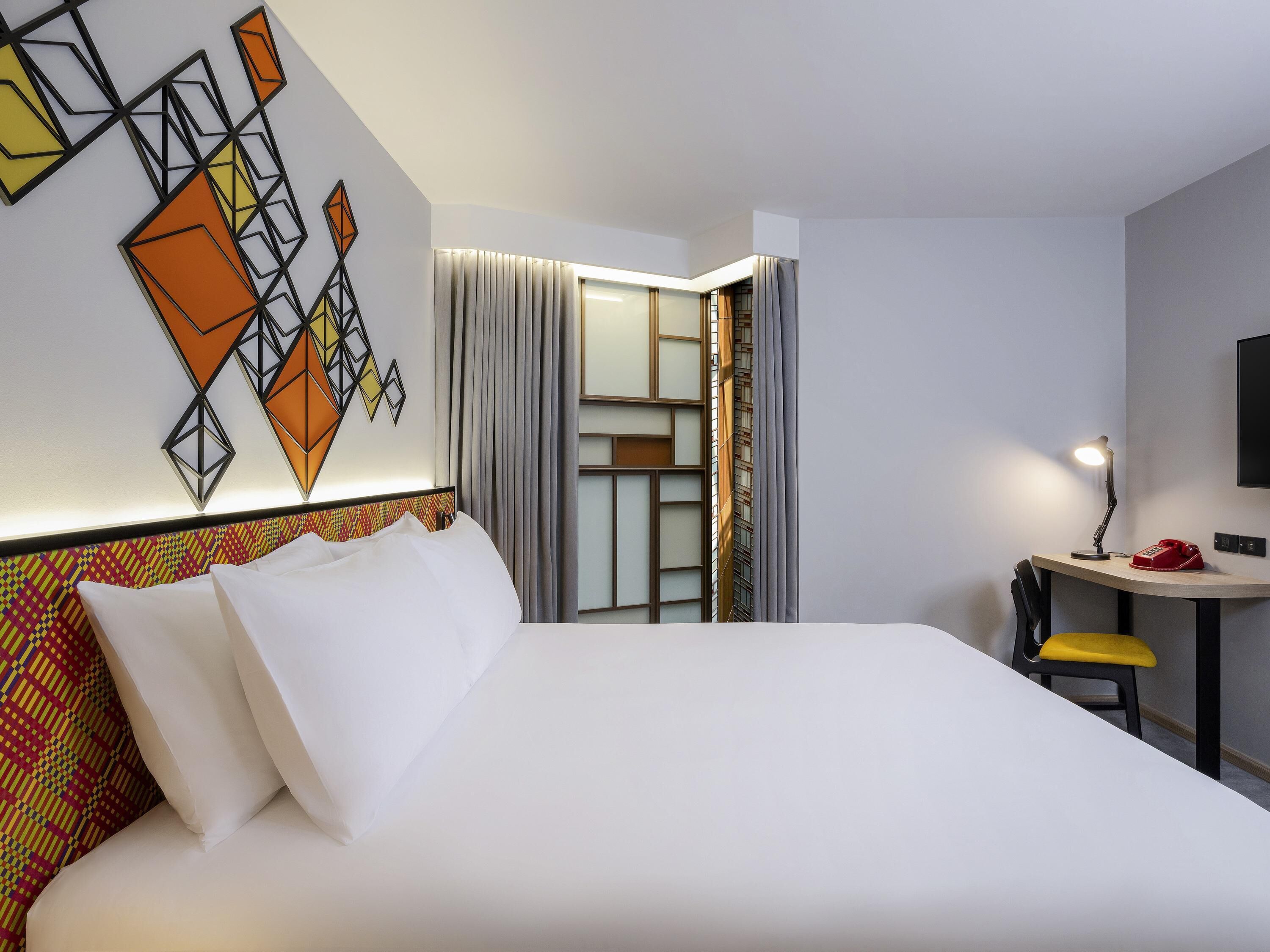 Premium Room, 1 King Bed | In-room safe, desk, laptop workspace, blackout drapes