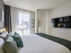 Appartement, 1 slaapkamer | 1 slaapkamer, luxe beddengoed, pillowtop-bedden, een bureau